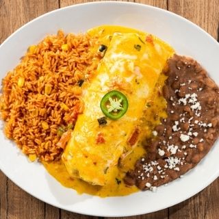 Classic Chimichanga: Seasoned ground beef or shredded chicken tinga, pico de gallo and cheese rolled in a flour tortilla smothered with chile con carne, sour cream sauce, green chile sauce, ranchero sauce or queso.