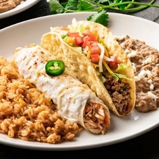 Pick 2 Combo: Choose any 2 items: Seasoned ground beef, chicken tinga, or Dos XX tacos; Cheese, seasoned ground beef, or chicken tinga enchiladas; Chicken flautas; beef or chicken empanadas; Chicken Tortilla Soup or house salad. Served with Mexican rice and choice of beans.