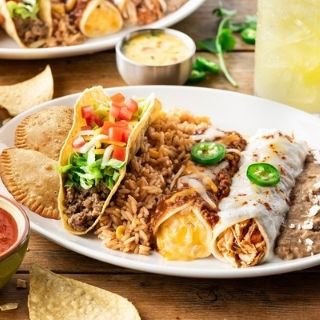Pick 4 Combo: Choose any 4 items: Seasoned ground beef, chicken tinga, or Dos XX tacos; Cheese, seasoned ground beef, or chicken tinga enchiladas; Chicken flautas; beef or chicken empanadas; Chicken Tortilla Soup or house salad. Served with Mexican rice and choice of beans.