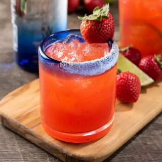 Strawberry Shaker Margarita: Premium strawberry margarita with 100% Blue Agave Milagro Silver Tequila, triple sec, house-made strawberry purée and fresh citrus sour, shaken and served tableside