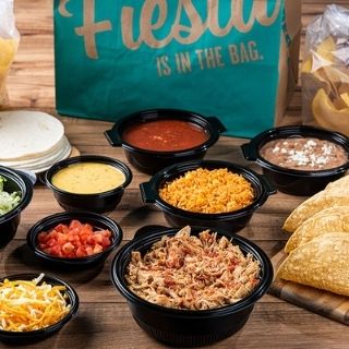 Build Your Own Taco Kit: Seasoned ground beef or chicken tinga, 10 flour tortillas or crispy taco shells, lettuce, tomato and mixed cheese. Served with Mexican rice, choice of beans, a bowl of signature queso and our famous chips & salsa.