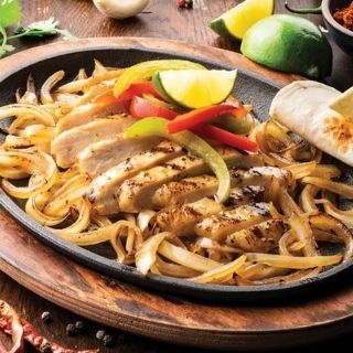 Border's Best Lunch Fajitas: A lunch-size portion of mesquite-grilled chicken or steak brought sizzling to your table. Served with warm flour tortillas, pico de gallo, cheese, Mexican rice and refried beans. Sour cream and guacamole are available upon request.