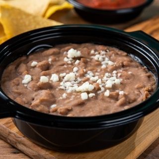 Refried Beans: An individual side or quart of our refried beans.