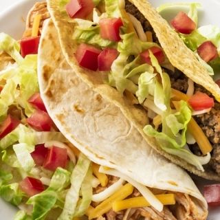 a la carte Tacos: Choose tacos a la carte including crispy or soft beef, chicken or veggie tacos.