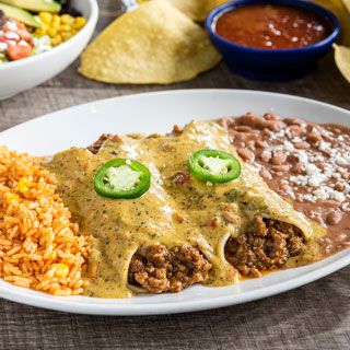 Border Queso Beef Enchiladas: Two seasoned ground beef enchiladas topped with our border queso. Served with Mexican rice and choice of beans.