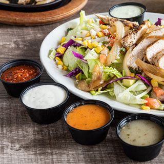 Salad Dressings: Choose from Ranch, Spicy Avocado Ranch, House-made Salsa, Lime Vinaigrette, or Smoked Jalapeno Vinaigrette.