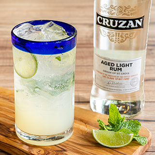 Mojito Clasico: Cruzan Aged Light rum and fresh lime juice shaken with fresh lime and mint leaves.